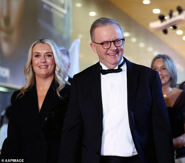 Anthony Albanese (pictured with partner Jodie Haydon) is accused of undermining the safety of nuclear power plants