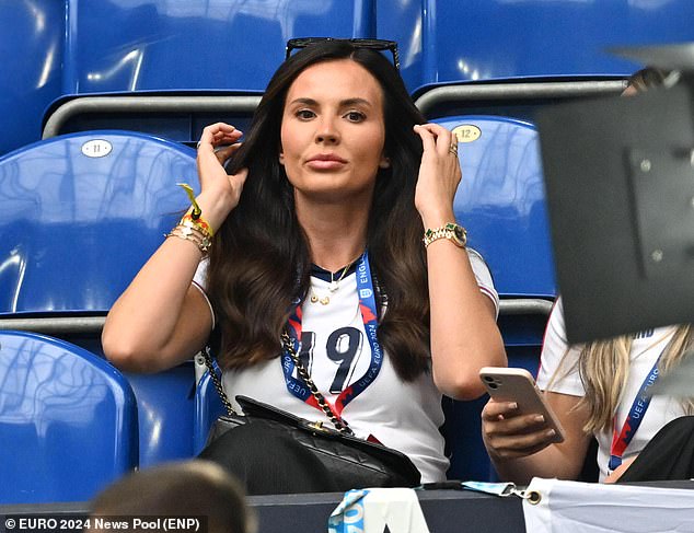 Ollie Watkins' girlfriend Ellie Alderson took her seat ahead of the 5:00pm GMT kick-off of the crucial match