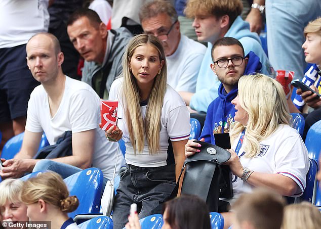 As the stadium started to fill up, Luke Shaw's partner Anouska Santos was spotted looking for her seat