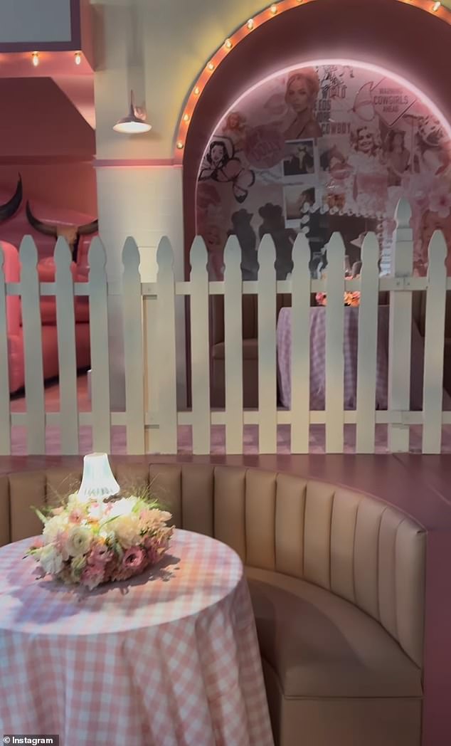 The decor was pink and white, including pink puffy furniture and tables covered in pink and white checked cloths