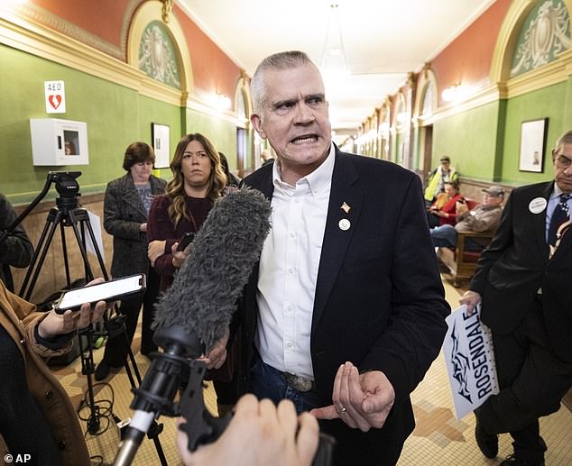 Republican Congressman Matt Rosendale (pictured at the Montana State Capitol on February 9) denied charges that he withdrew from the US Senate race because he impregnated a 20-year-old staffer