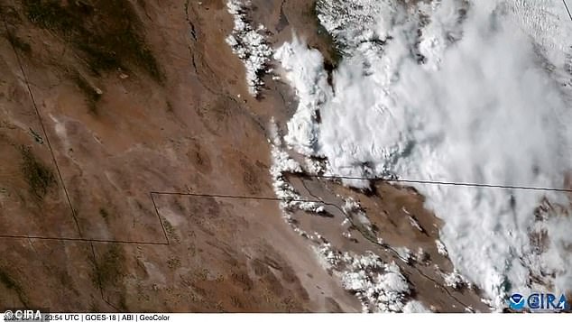 A massive and destructive dust storm – more than 200 miles long – tore through New Mexico on Wednesday, sending up clouds of debris visible from space – via satellite images managed by Colorado State's Cooperative Institute for Research in the Atmosphere (above)