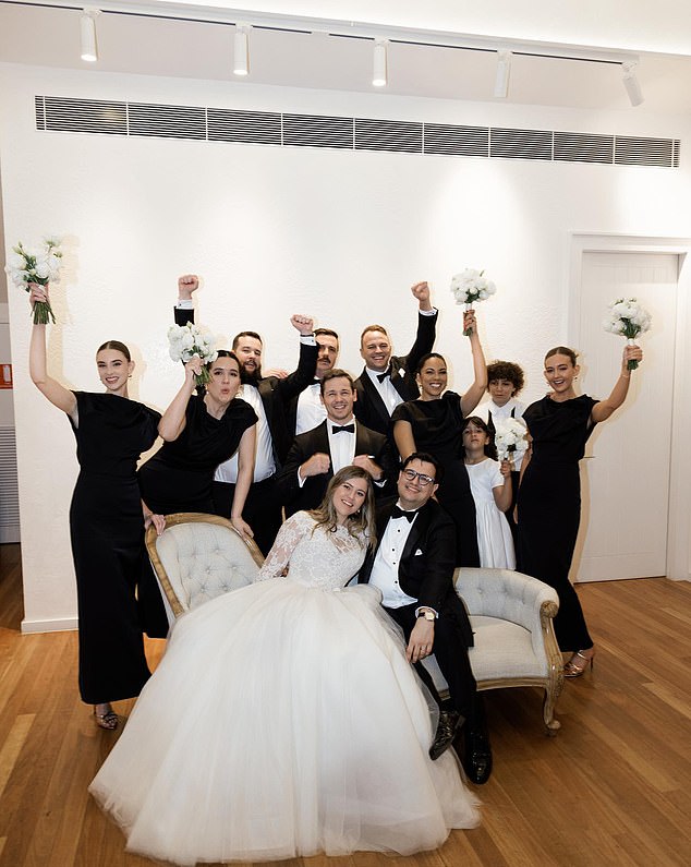 The wedding party is pictured, including best man Alan Horner (back row, center, with mustache).  Maid of Honor Emma Webster is second from left.  David Sharaz's sister is right behind him