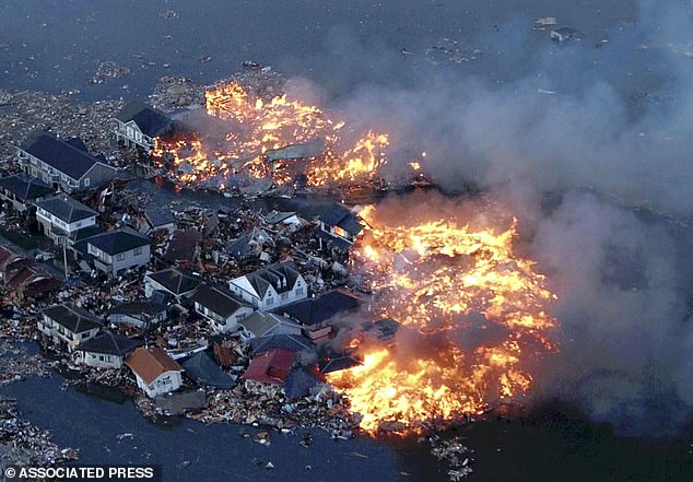 If the fault were to rupture, it could last about five minutes and cause tsunamis as high as 100 feet (30 meters), damaging more than half a million buildings and killing countless people in its wake.  Pictured: A magnitude 9.0 earthquake devastated Japan in 2011