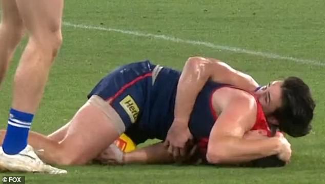 Demons defender Steven May has been charged with staging during last night's match