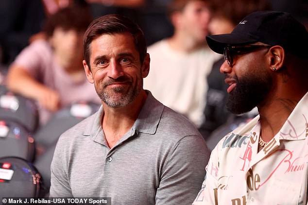 Aaron Rodgers with former NFL star Marcedes Lewis (R) at UFC 303 at T-Mobile Arena in Las Vegas