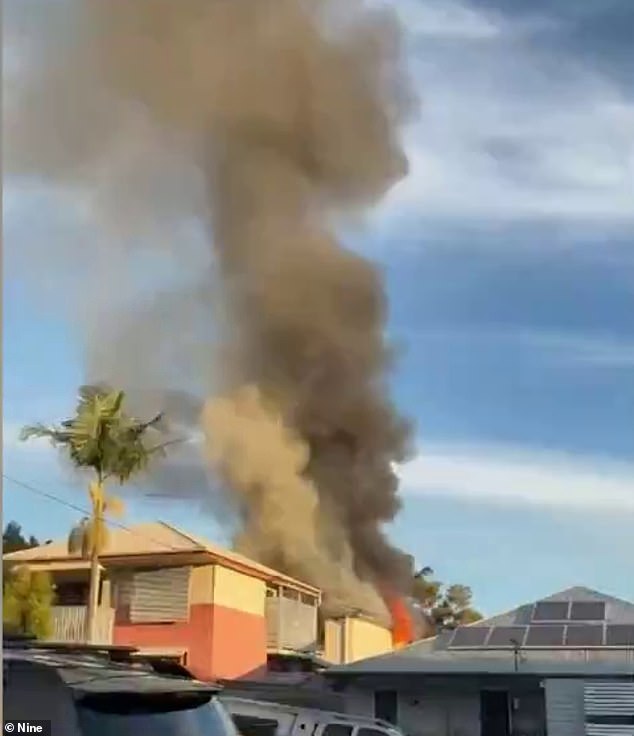 A man is dead and a woman suffered serious burns at a unit complex in Brisbane's north-east