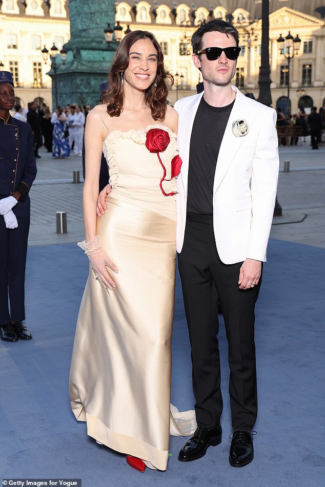 Alexa Chung and Tom Sturridge made a seriously stylish pair as they arrived at Vogue World: Paris at Place Vendome in the French capital on Sunday evening