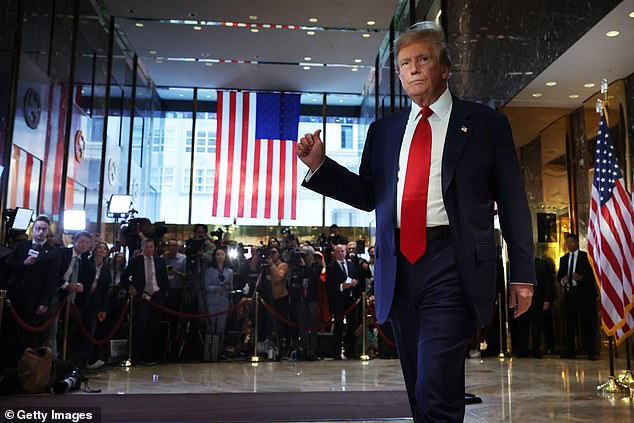 Donald Trump walks away after addressing the media following his convictions on Friday.  Trump was found guilty of 34 counts of falsifying corporate records for covering up the hush money payment to Stormy Daniels before the 2016 election