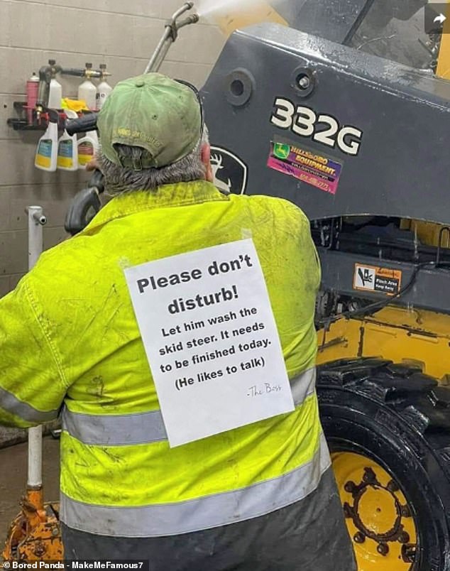 This worker wasn't aware of a coworker's sign taped to his back, but judging by his focus, it seems to have worked