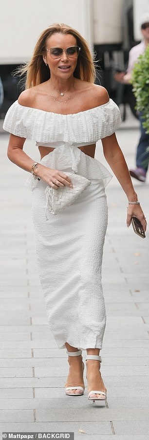 Amanda Holden beamed in a glamorous white dress, while Ashley Roberts showed off her abs in low-cut jeans as the pair left the Heart FM studios on Friday