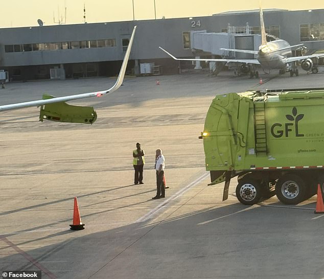 An American Airlines plane was hit by a garbage truck while passengers were waiting to take off in North Carolina.