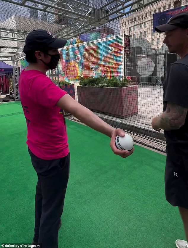 Steyn (right) is pictured receiving bowling lessons during his trip to the Big Apple to take part in cricket's T20 World Cup