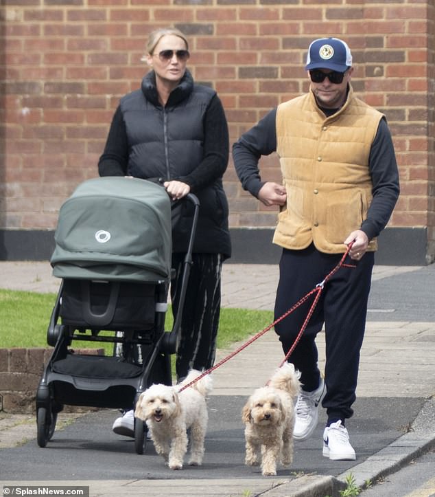 Ant McPartlin, 48, enjoyed a sunny dog ​​walk with wife Ann-Marie, 46, and son Wilder in London on Thursday