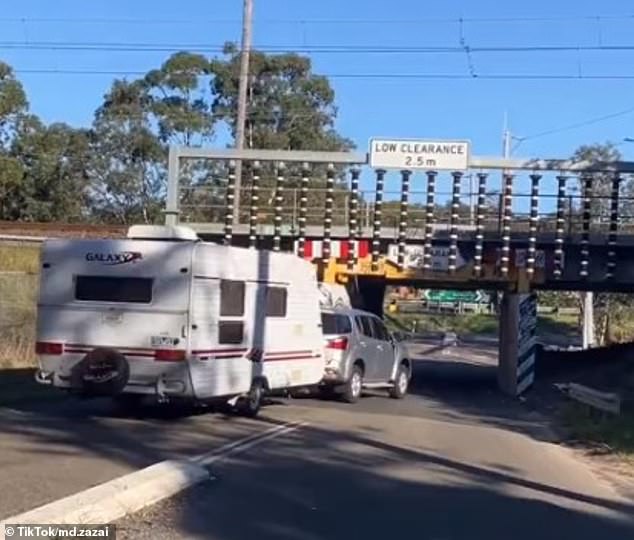 The driver, who was towing a campervan, was driving through NSW's Central Coast when they almost crashed into the Woy Woy railway underpass (pictured)