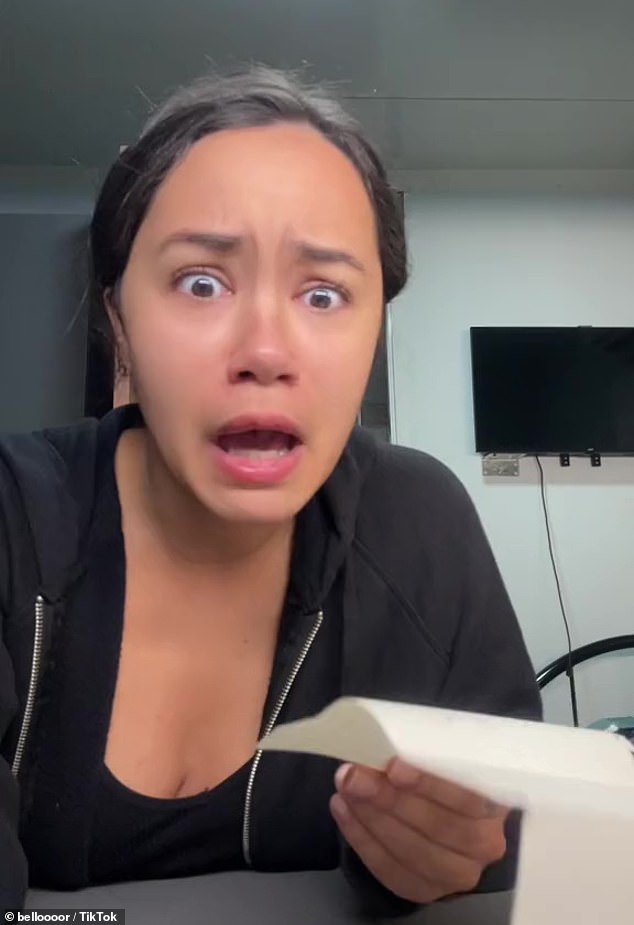 In a video that has been viewed almost 80,000 times on TikTok, Isabella (pictured) decided to share what was written on the piece of paper that a colleague slipped under her door