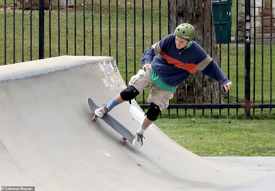 Fin, who came out as non-binary in April, practiced various skateboarding tricks, including ollies and riding a ramp