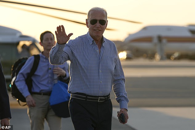 President Joe Biden waves before spending a week at Camp David, where he and aides are preparing for Thursday night's debate in Atlanta — where he has only a notepad, a pencil and a bottle of water to get him through a 90-minute debate against the former president to guide Donald Trump