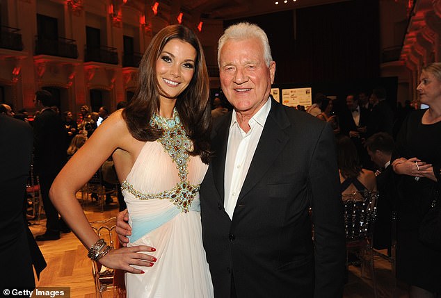 Stronach with Carmen Stamboli at the 2014 Miss Vienna pageant. The Austrian-Canadian businessman was arrested in the upscale Toronto suburb of Aurora