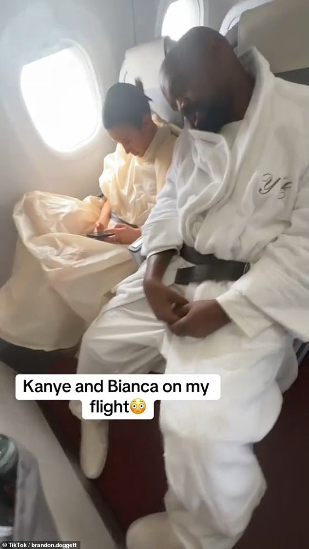 Billionaire Kanye West wore a personalized 'Ye' robe and took a nap as he and wife Bianca Censori flew economy to Japan earlier this week