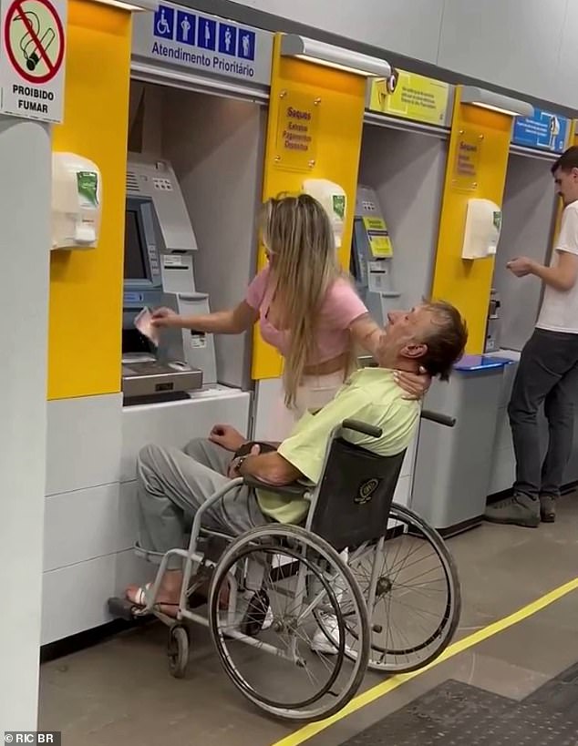 A viral video showed the moment a woman used the body of a man who appeared to be dead to withdraw money from an ATM.  The incident reportedly took place in Brazil, although police have not commented
