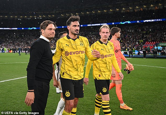 Terzic has reportedly offered to resign as Dortmund manager after a 'violent confrontation' with Mats Hummels (centre)