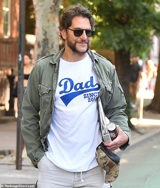 Bradley Cooper, 49, continued to embrace his latest scruffy look as he enjoyed an outing in New York City on Tuesday