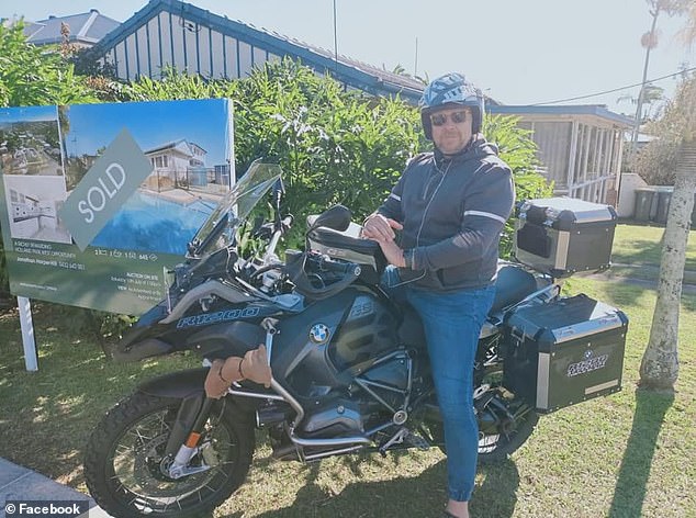 Shane McGrath, 57, got off his bike as he crossed the Story Bridge at Kangaroo Point, south Brisbane, on Sunday morning