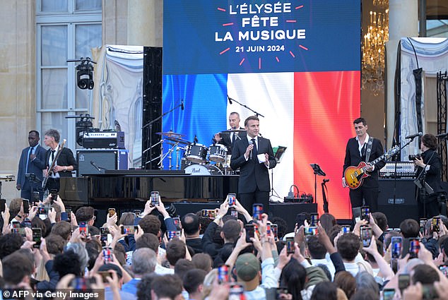 French President Emmanuel Macron speaks during the annual congress "Festival of music" one-day music festival in the courtyard of the Elysee Presidential Palace in Paris on June 21, 2024. June 21 marks the annual start of 'Fete de la Musique', a tradition marking the first day of summer, when music is encouraged to be played outdoors