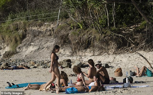 Party balloons should be banned at all Byron Shire Council-owned venues in northern NSW.  The photo shows beachgoers in the tourist hotspot