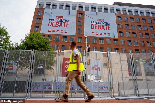 A high fence surrounds the entire venue for Thursday night's presidential debate between President Joe Biden and former President Donald Trump, amid concerns about mass protests and demonstrations outside CNN headquarters
