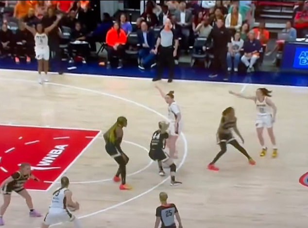 A clip from the Fever-Mystics game showed Caitlin Clark (R) drawing three defensemen