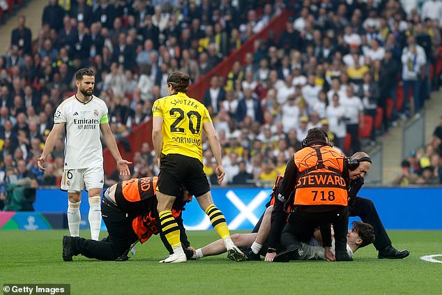 Three pitch invaders stormed the Wembley turf in the opening minute of the Champions League final