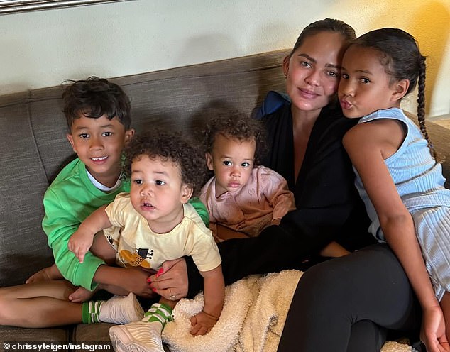 Chrissy Teigen shared adorable photos of herself with her four children: Esti, Luna, Miles and Wren, on Instagram on Saturday.