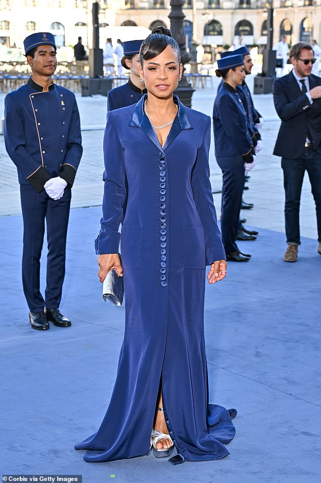 Christina Milian cut a stylish figure in a royal blue button-up dress as she hit the carpet at Vogue World Paris on Sunday evening