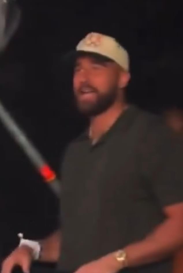 Fans reacted to a viral clip of Taylor Swift waving at Travis Kelce while singing 