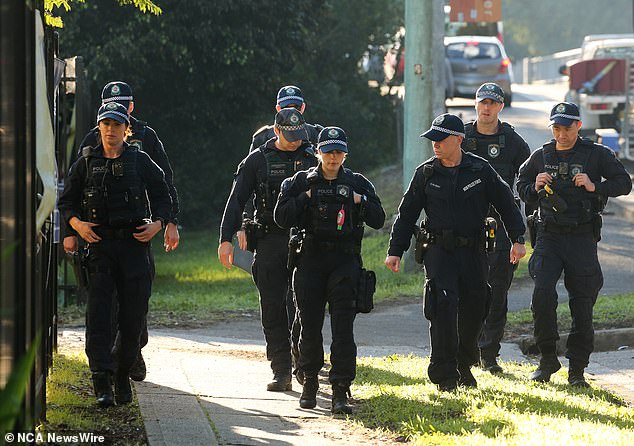 A leading criminal psychologist has warned it could be 'virtually impossible' to find a missing mother who gave birth to a child next to a filthy river in Sydney (pictured, police at the scene)