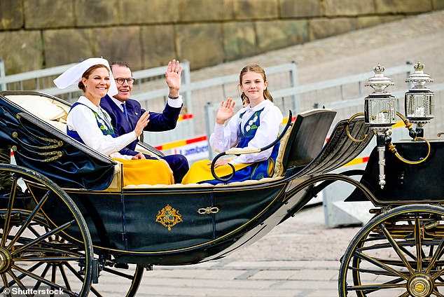 Accompanied by Prince Daniel, Crown Princess Victoria and Princess Estelle rode through Stockholm in a horse-drawn carriage