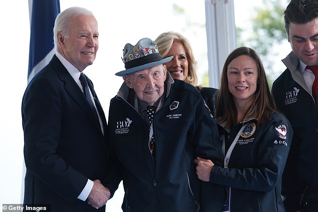 Honored: World War II veteran and TikToker Jake M. Larson is pictured with President Joe Biden during the 80th anniversary of the Normandy landings on Thursday