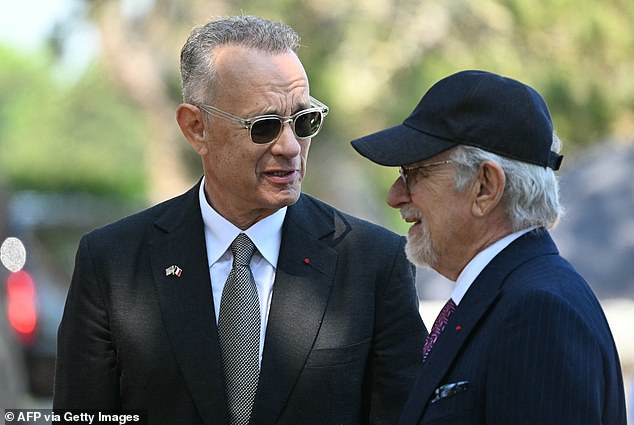 Hanks and Spielberg were seen talking at the Normandy American Cemetery and Memorial in Colleville-sur-Mer, which overlooks Omaha Beach