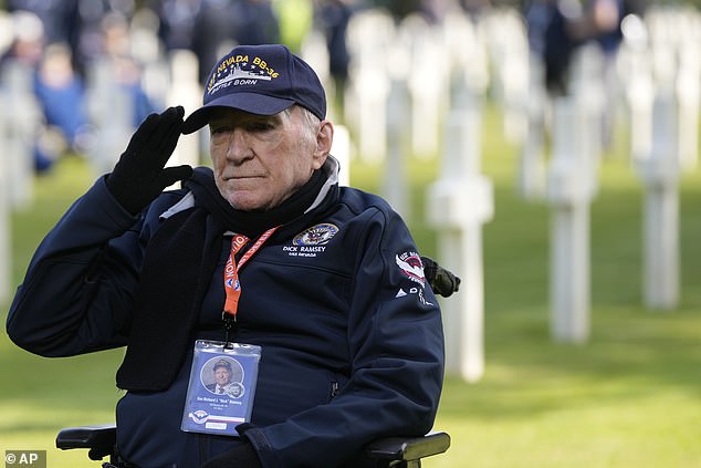 Heroic D-Day veteran Richard Ramsey salutes the graves at the Normandy American Cemetery on Tuesday, June 4, 2024