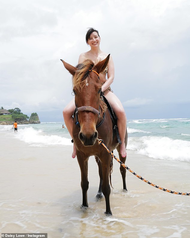 The catwalk favorite shared a handful of stunning bikini-clad photos posing on a horse as she rode along the sea in Indonesia in April