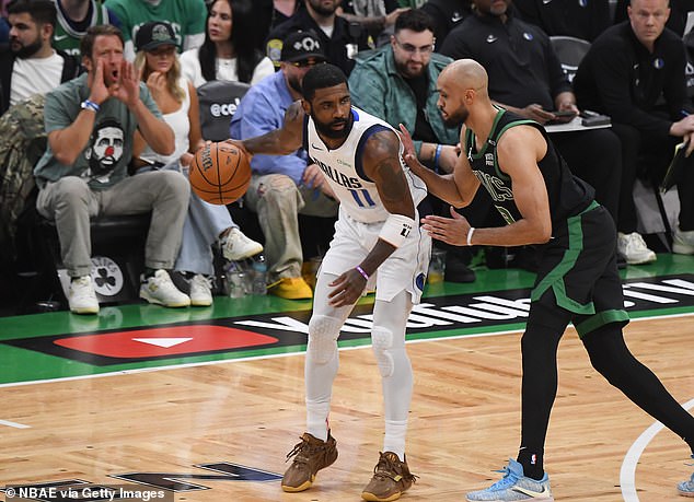 Portnoy, 47, saw cheering in the background as Irving controlled the ball in play