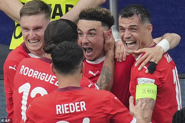 Switzerland are through to the quarter-finals of the 2024 European Championship after beating Italy 2-0 in Berlin