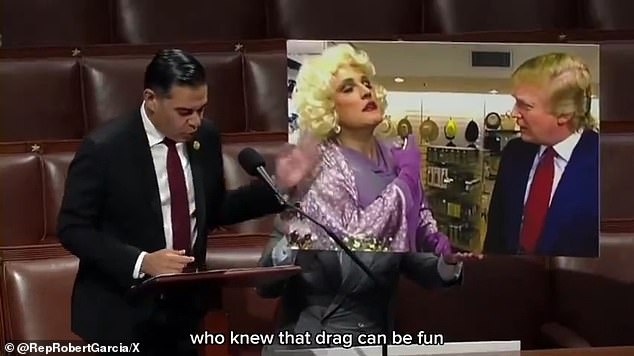 Rep. Robert Garcia, D-Calif., displayed a poster showing Rudy Giuliani in drag to condemn the Republican's efforts to ban military funding for drag shows