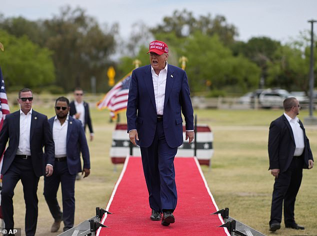 Former President Donald Trump wrapped up his pre-sentencing interview virtually with probation officers in New York City on Monday afternoon.  Pictured: Trump arriving to speak at a campaign rally in Las Vegas, Nevada on June 9, 2024