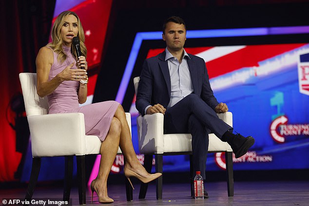Charlie Kirk, head of Turning Point Action, with Lara Trump, co-chair of the Republican National Committee, on stage in Detroit, Michigan