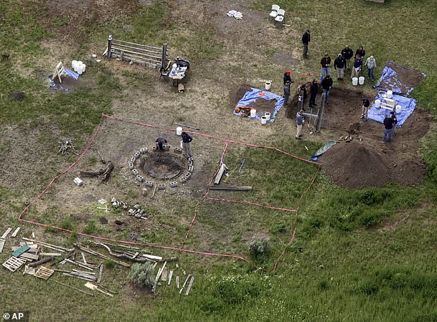 In this June 9, 2020 aerial photo, investigators search for human remains at Chad Daybell's home in Salem, Idaho