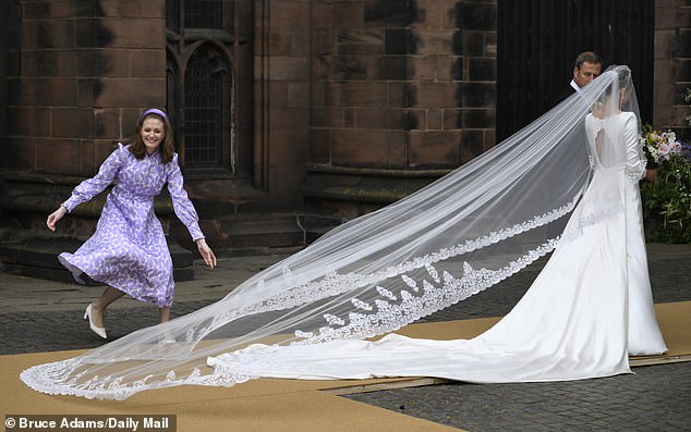 Olivia's beautiful wedding dress had a partially open back when she arrived at Chester Cathedral