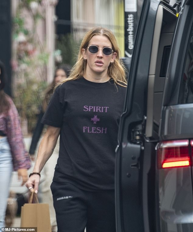 Ellie Goulding cut a casual figure in an all-black ensemble as she ran errands and went shopping in London's Notting Hill on Tuesday